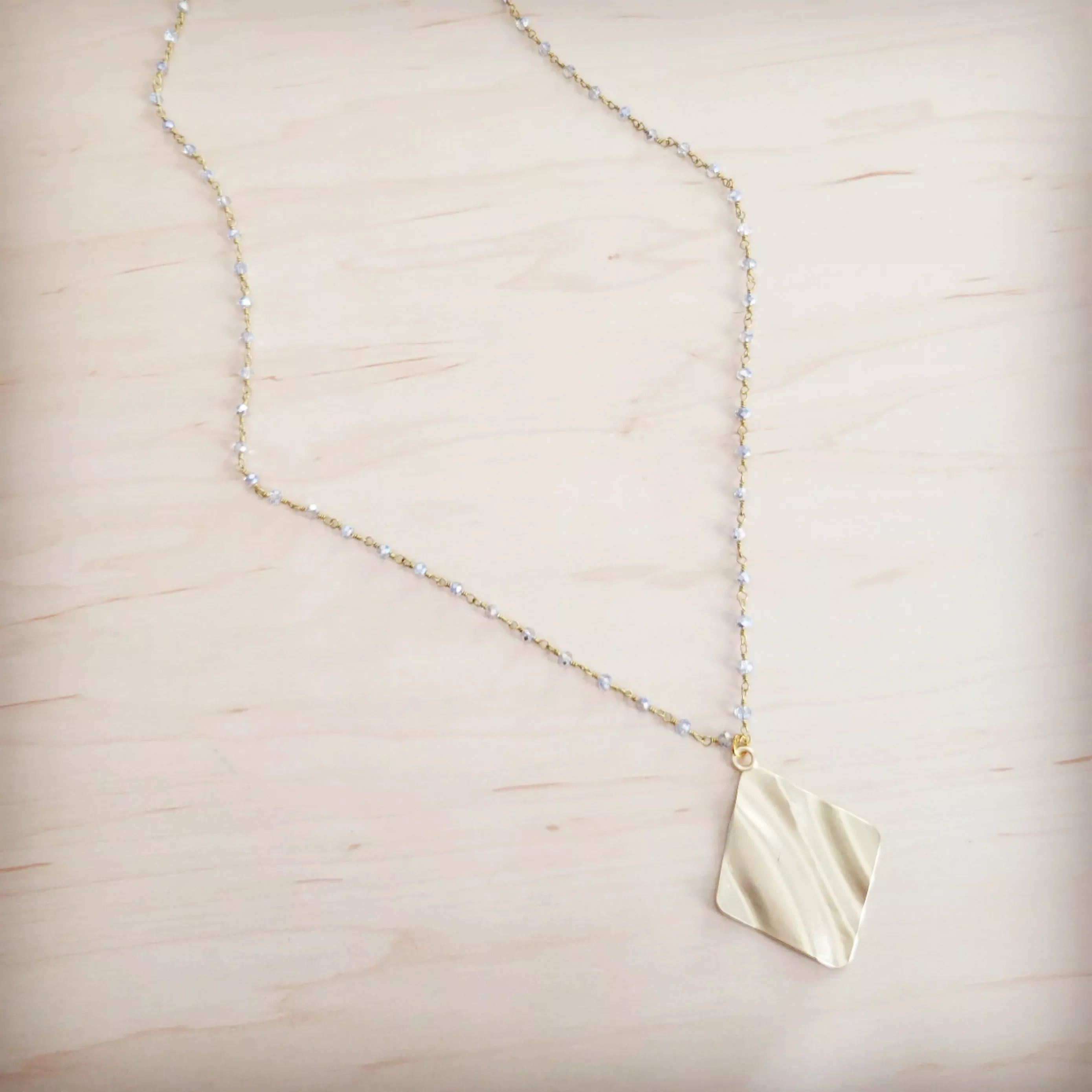 **Gilded Wave Pendant Necklace 257mb